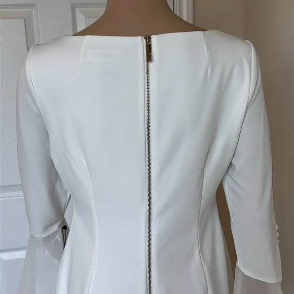 Elegant Calvin Klein White Dress with Flared Sleeves. - Picture 5 of 15